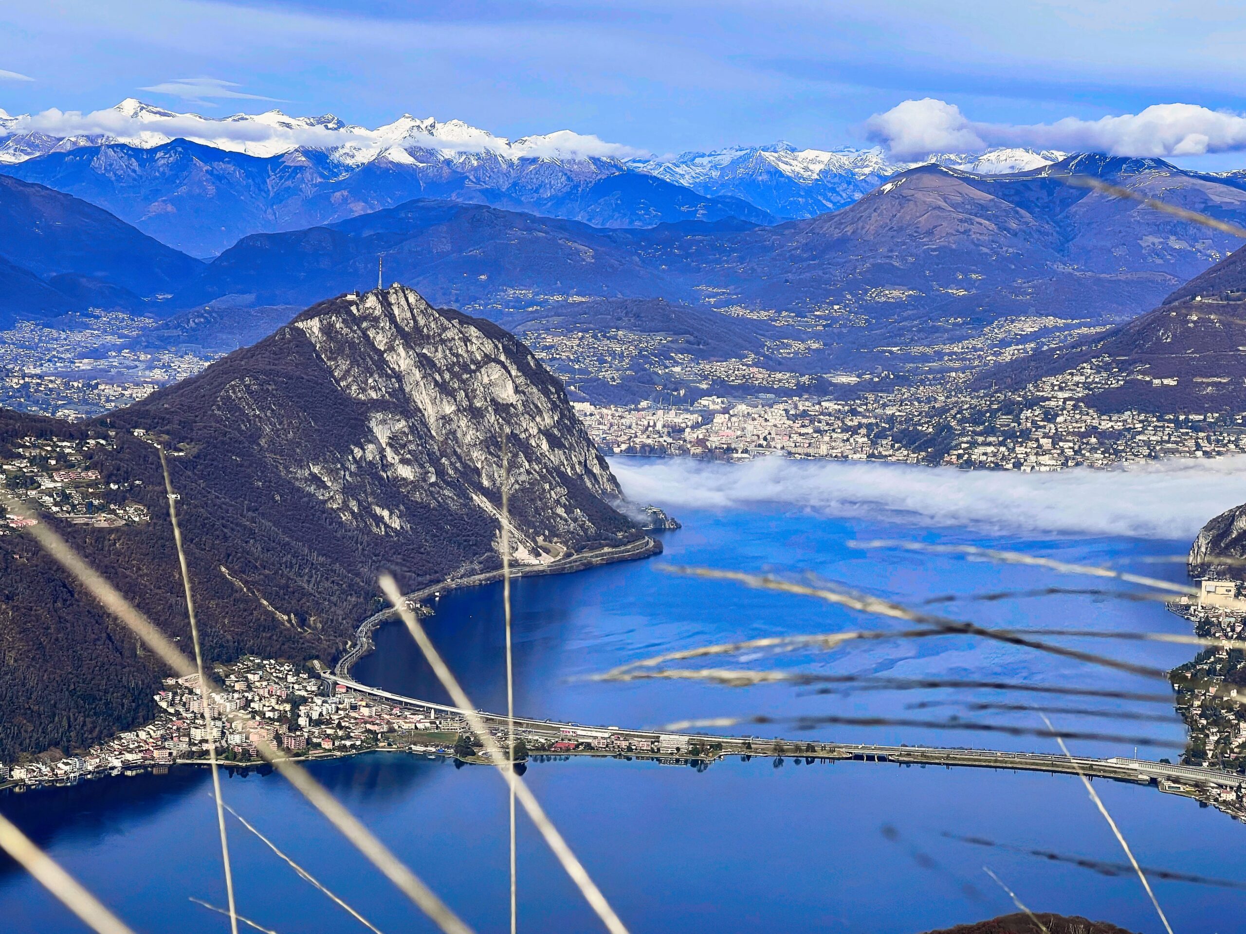 the magic and beauty of Lake Lugano seen from Monte San Giorgio, a UNESCO heritage site in Menrisiotto